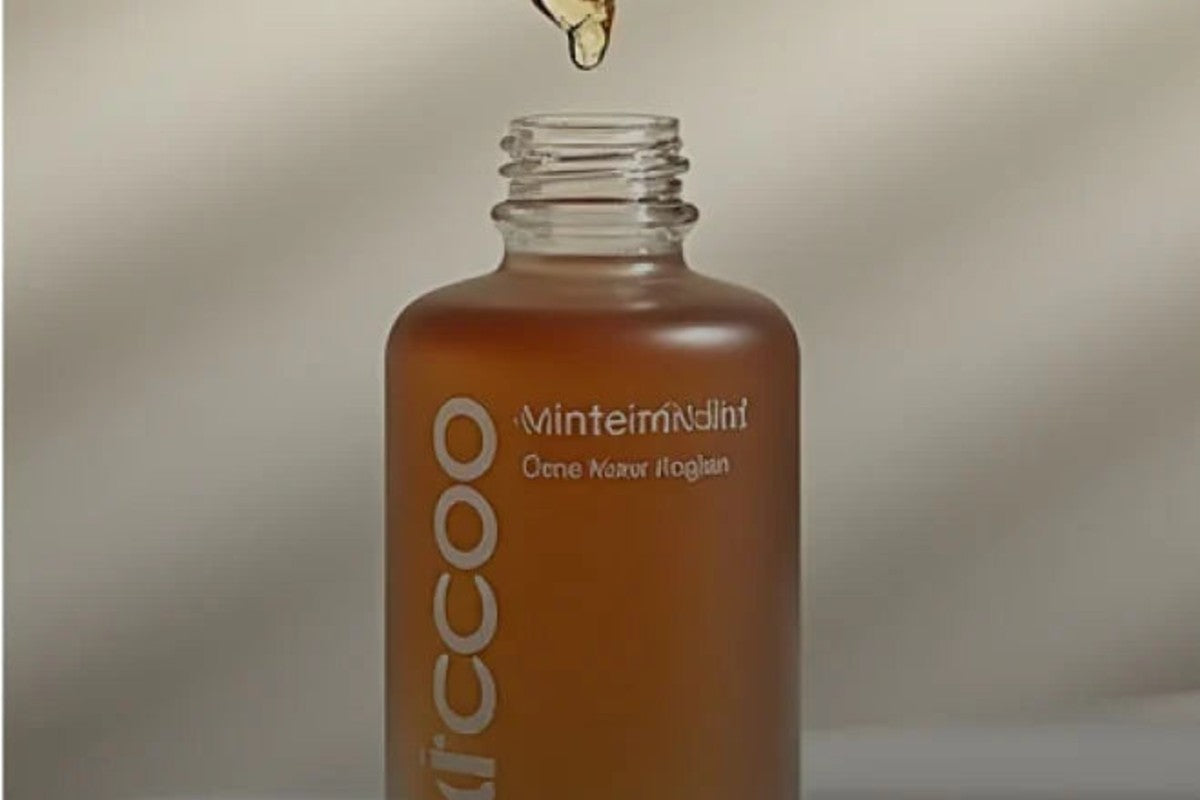Serum dropper bottle on a stone surface