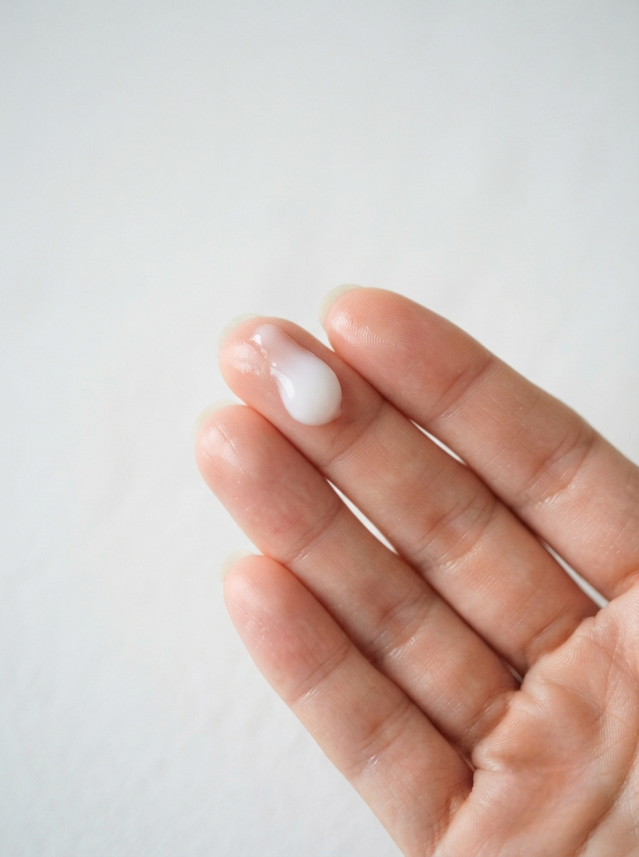 Take a pea-sized amount of the RetiBright rejuvenating night cream onto your clean fingertips