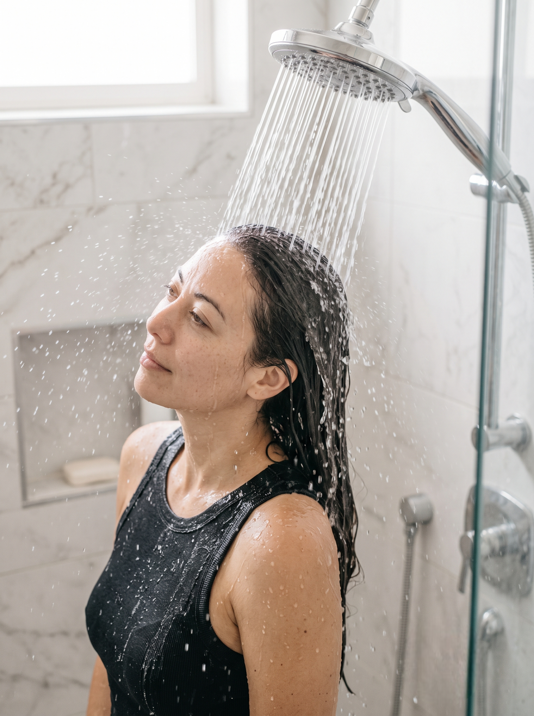 Rinse your scalp and hair thoroughly with clean water until all the lather is completely removed.